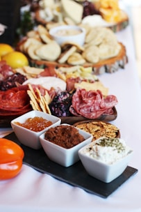 a table topped with lots of different types of food