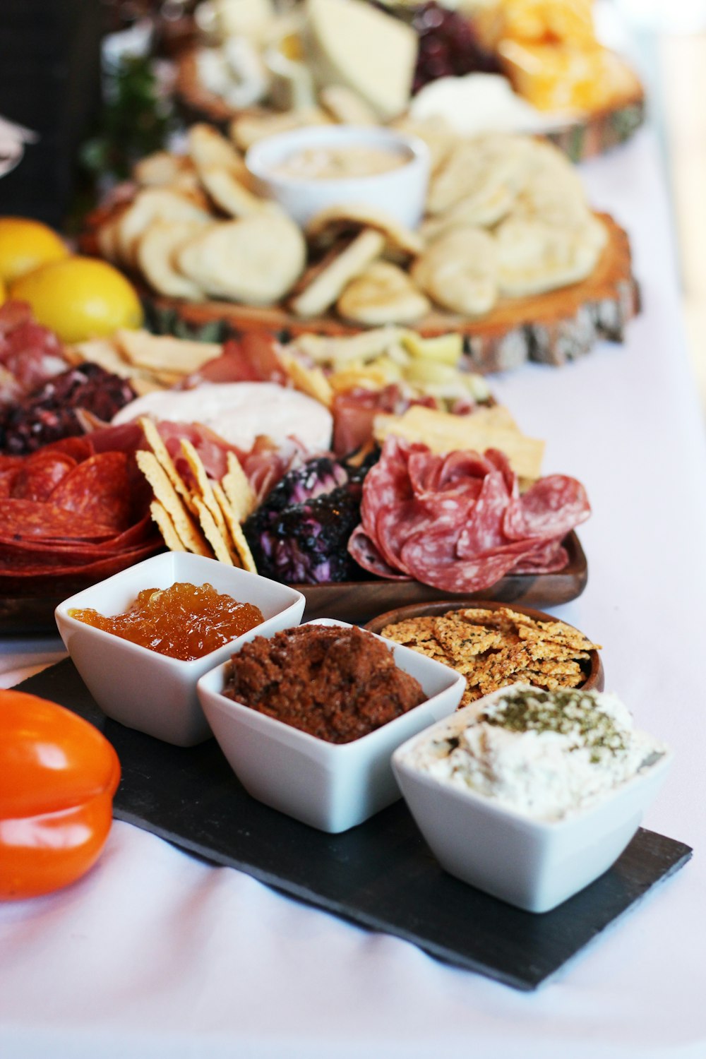 a table topped with lots of different types of food