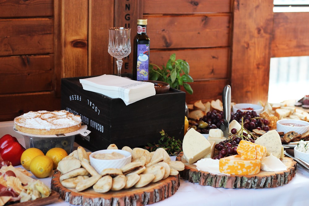 a table topped with lots of different types of food