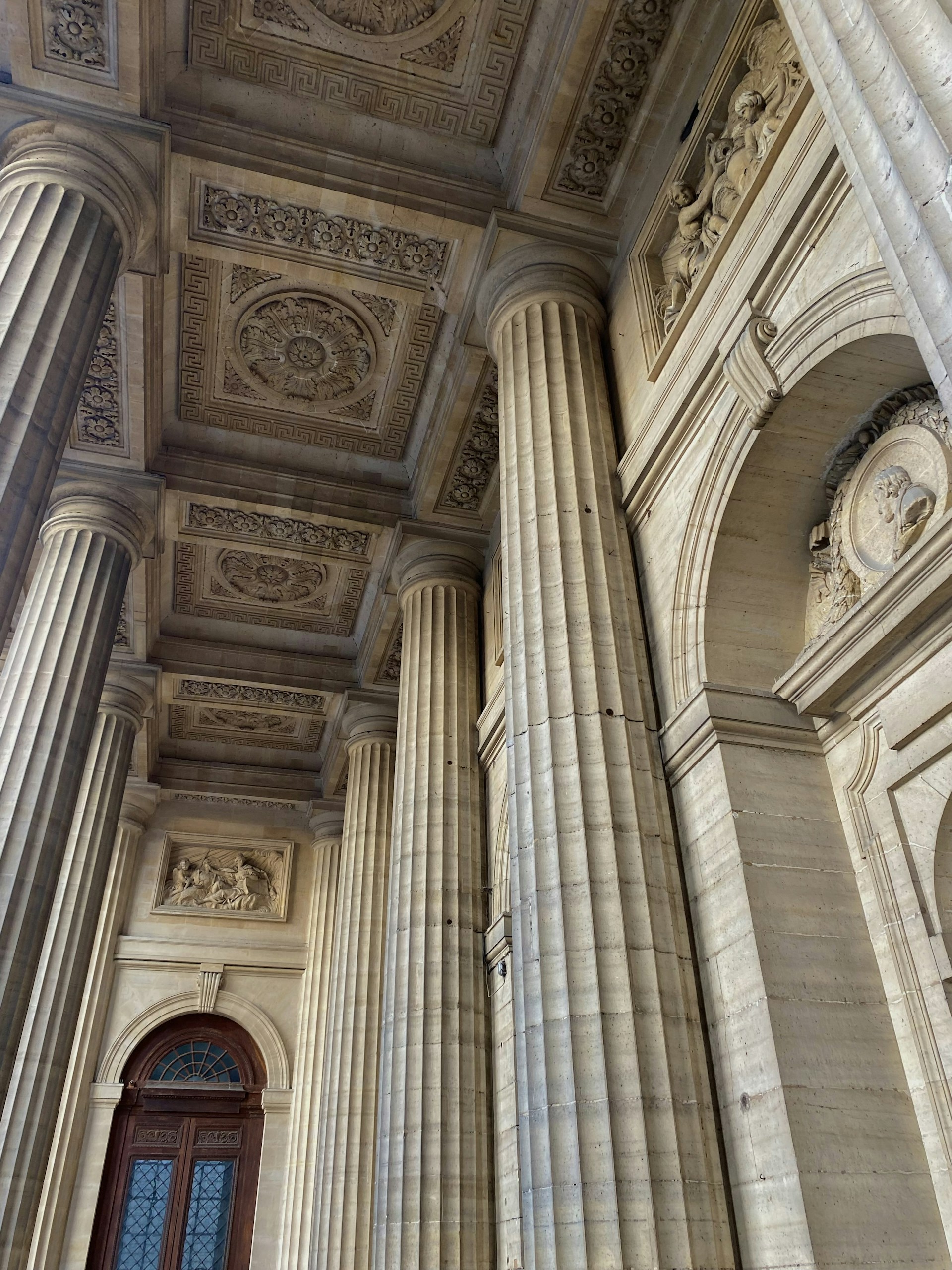 a very tall building with a bunch of columns