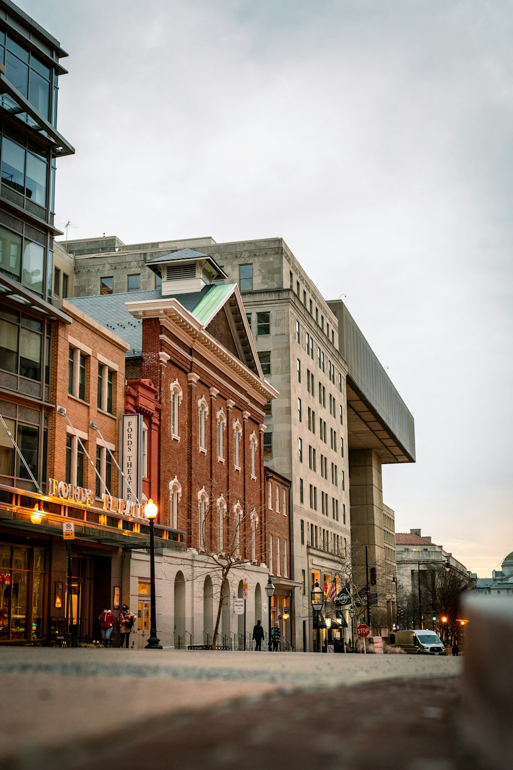 a row of buildings on a city street