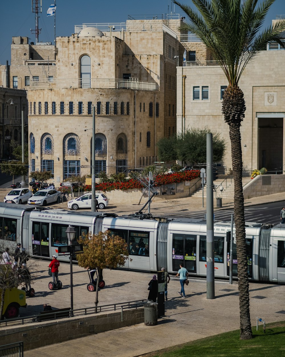 a train is parked in front of a building