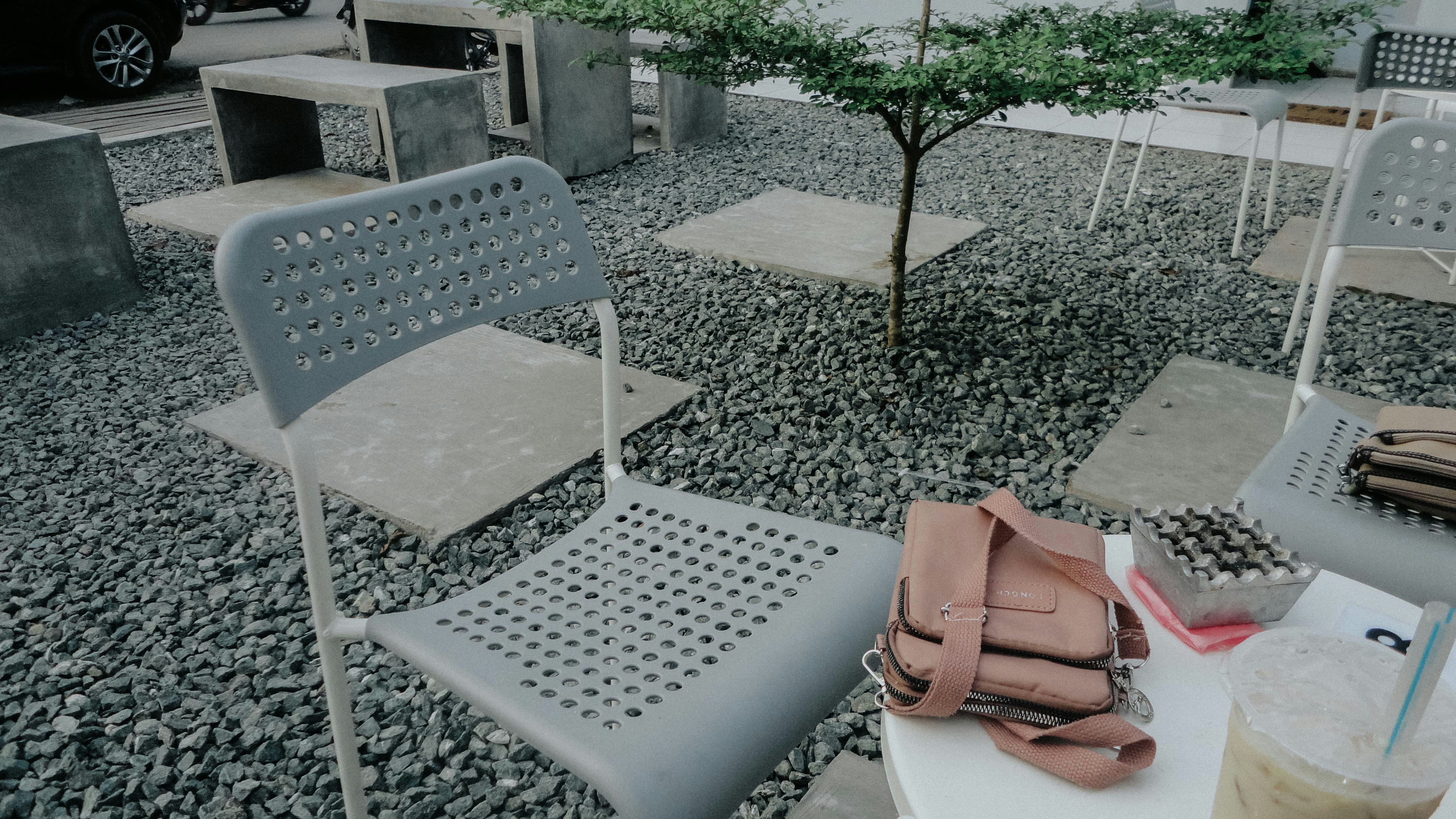 Outdoor seating area at a modern cafe.