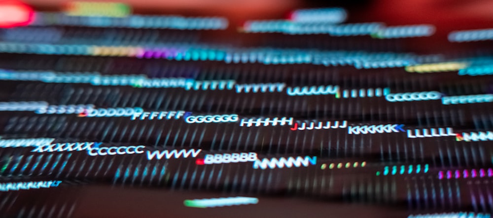 a close up of a computer keyboard with a blurry background