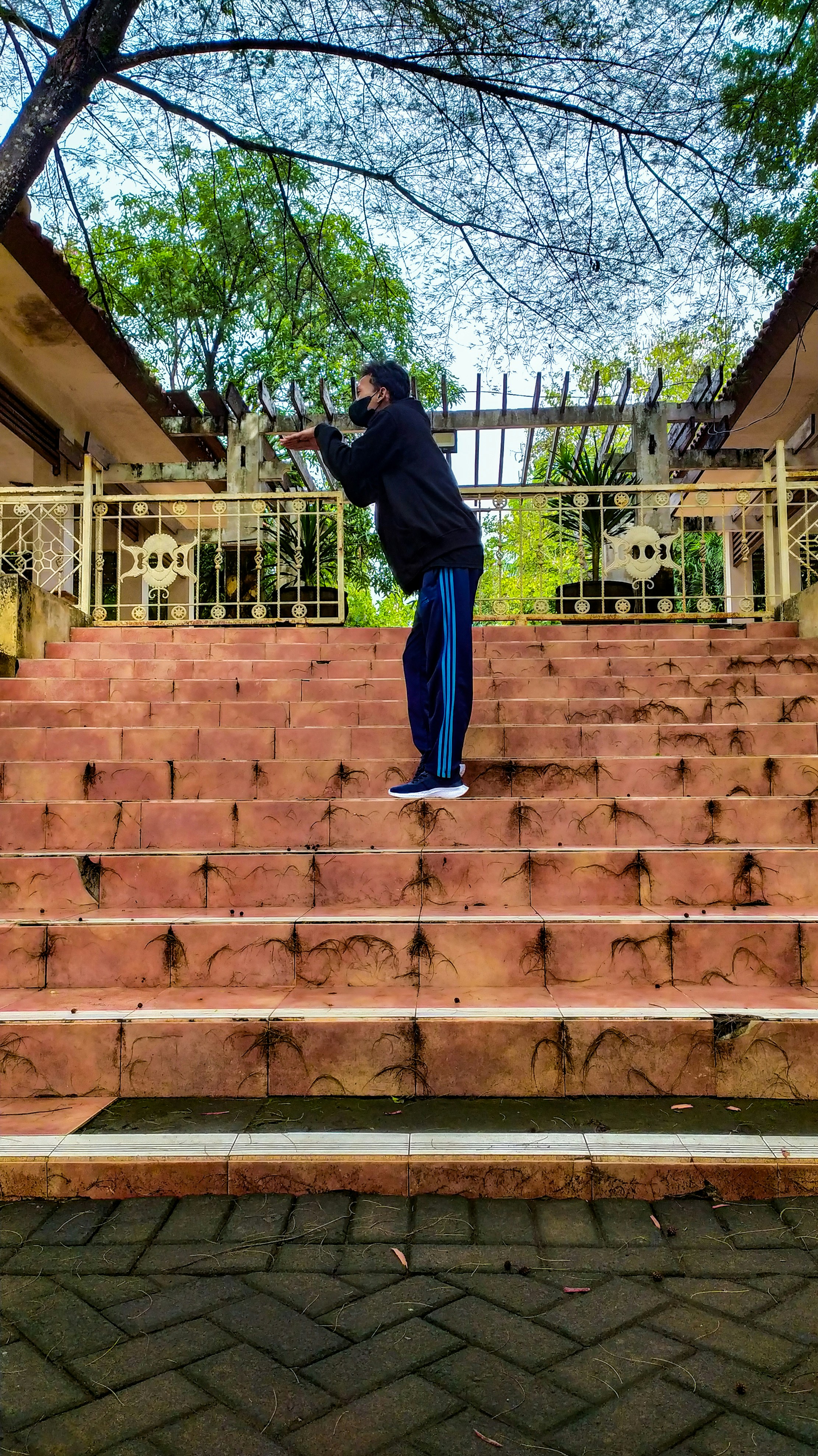 a man standing on a set of stairs