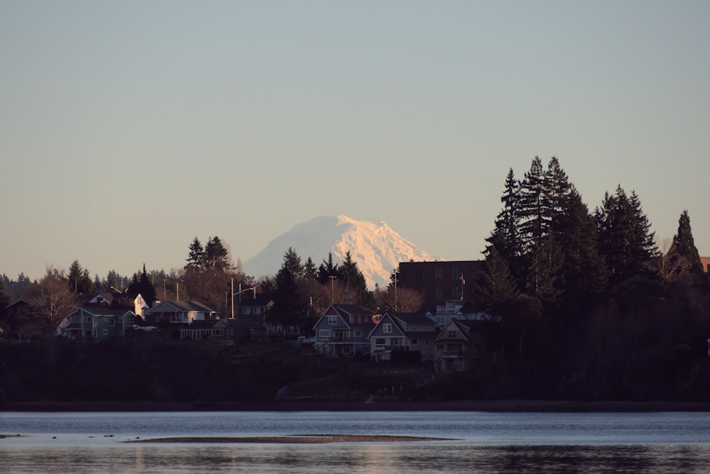 a view of a snow covered mountain in the distance