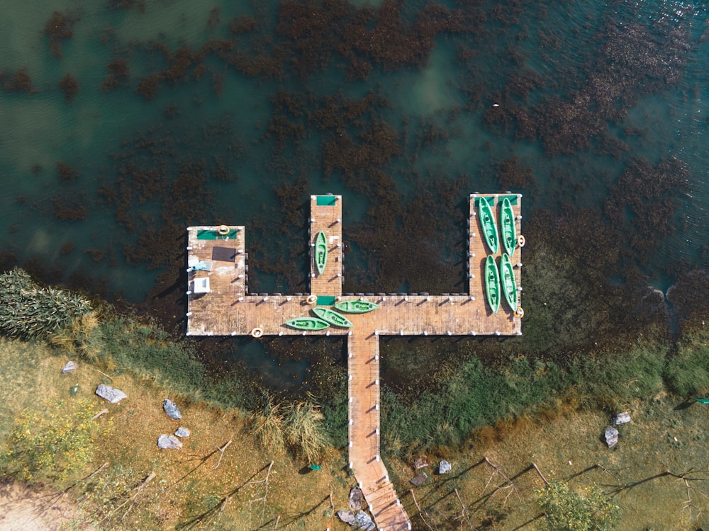 an aerial view of a large wooden cross