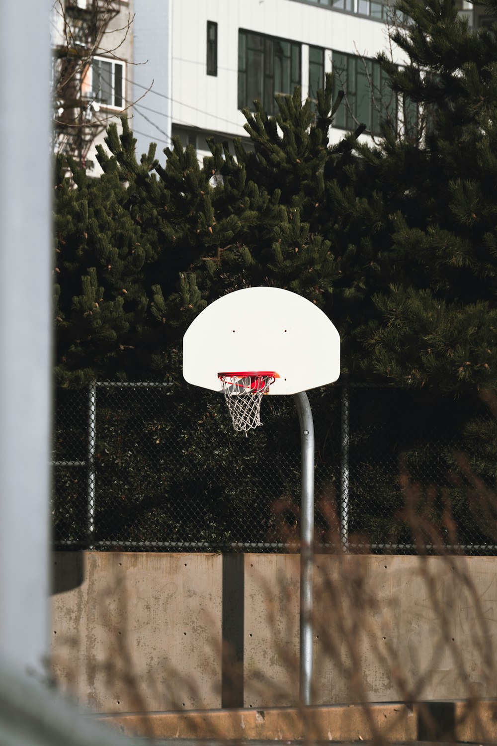 a basketball hoop in front of a building