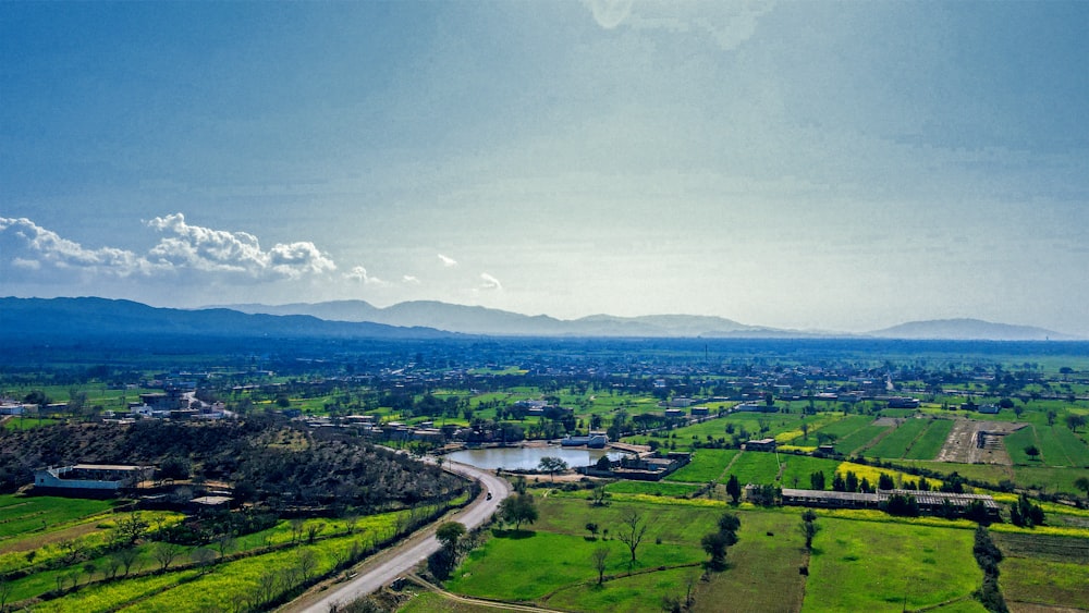 an aerial view of a rural area with a river running through it