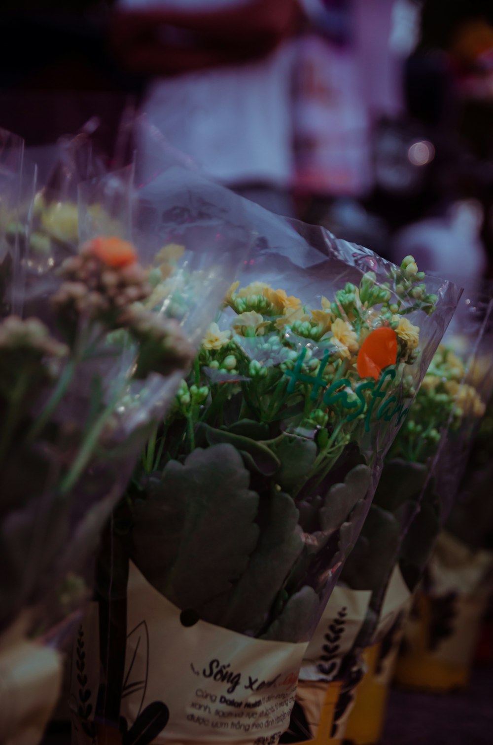 a bunch of flowers that are sitting on a table