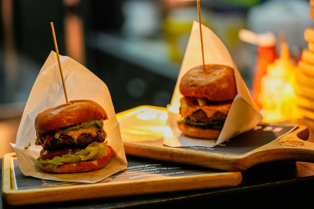 a couple of sandwiches sitting on top of a tray