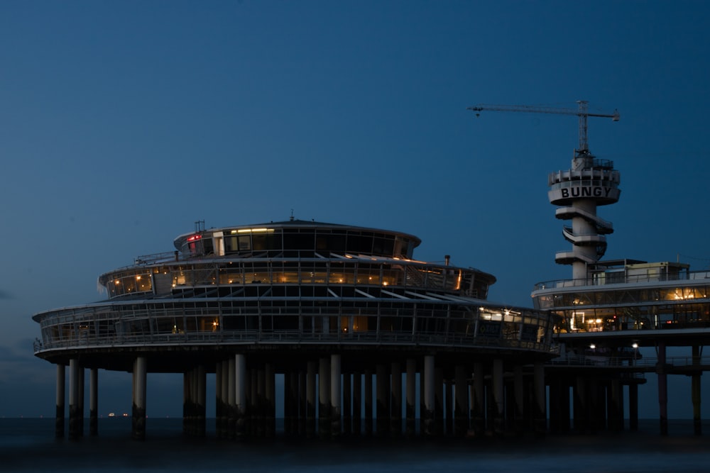 a large building sitting on top of a body of water