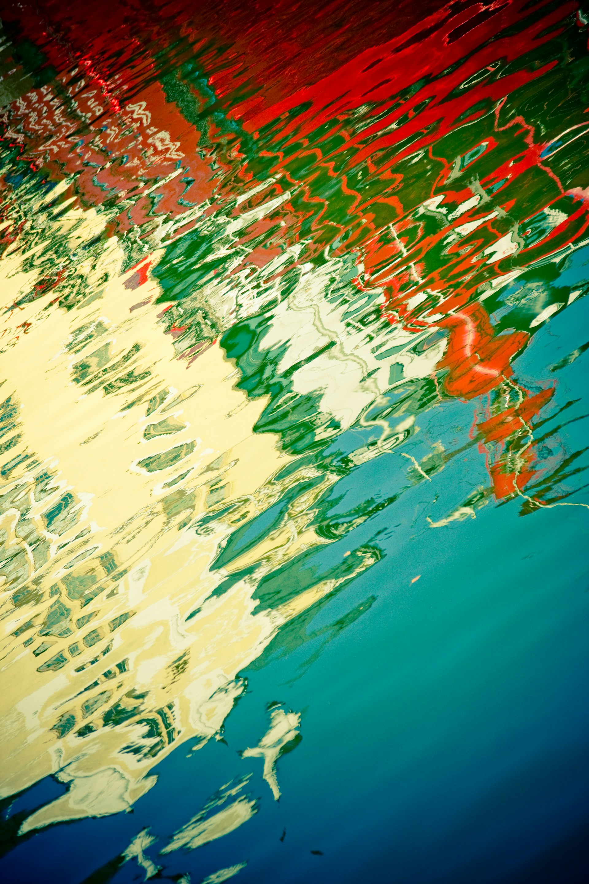 a reflection of a building in the water