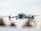 A sleek, modern drone captured in mid-flight against a blurred background. Its design features four propellers and a camera mounted at the front, embodying a high-tech aesthetic.