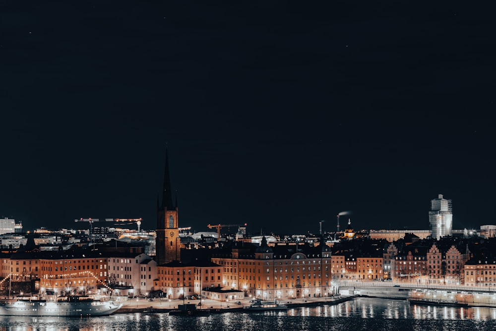 a view of a city at night from across the water