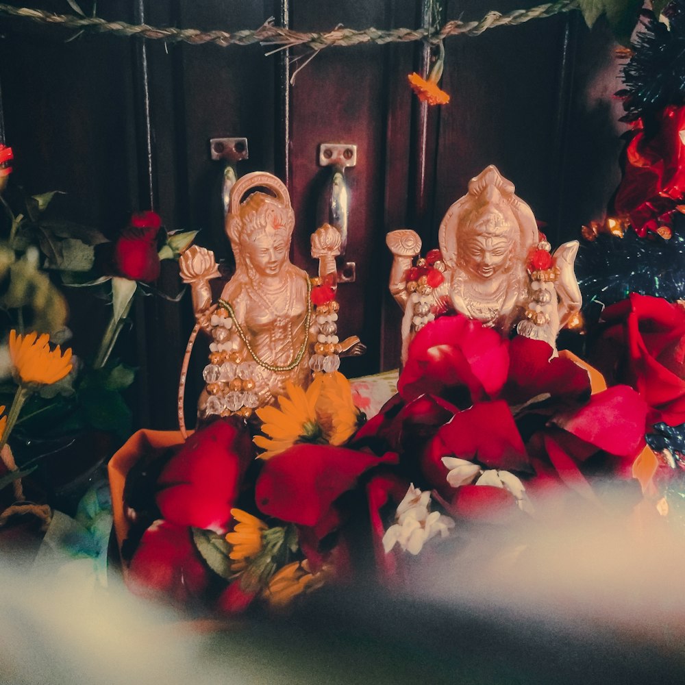 a bunch of flowers that are sitting on a table