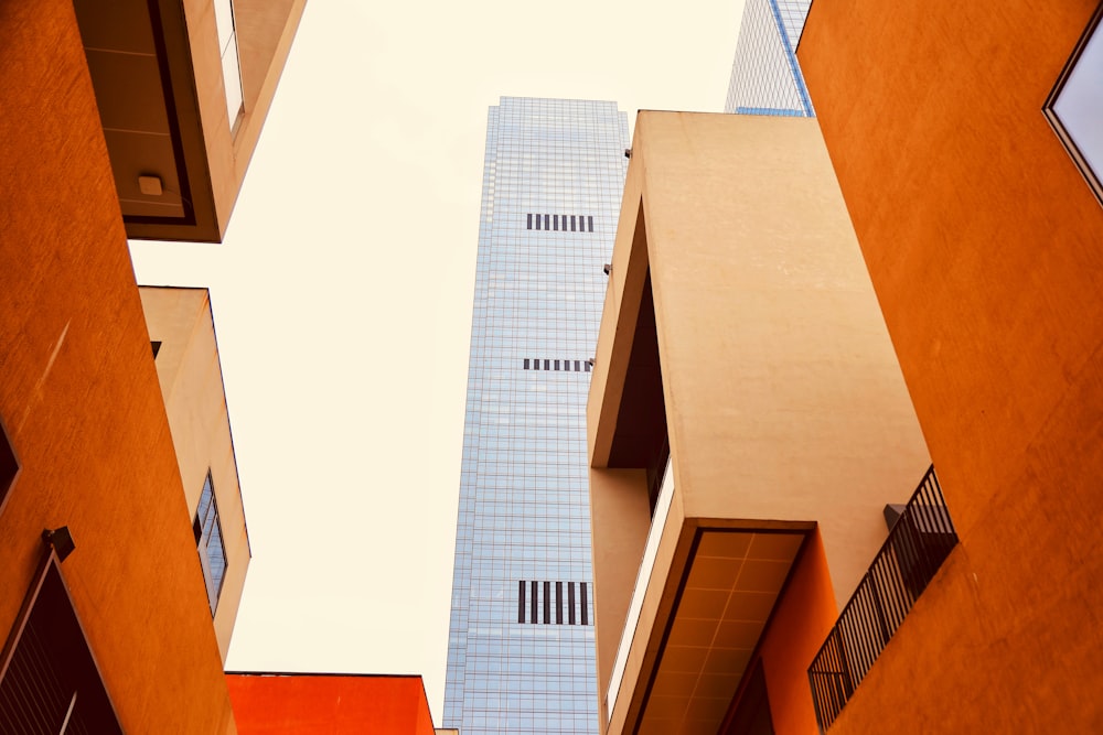 a view of a tall building from the ground