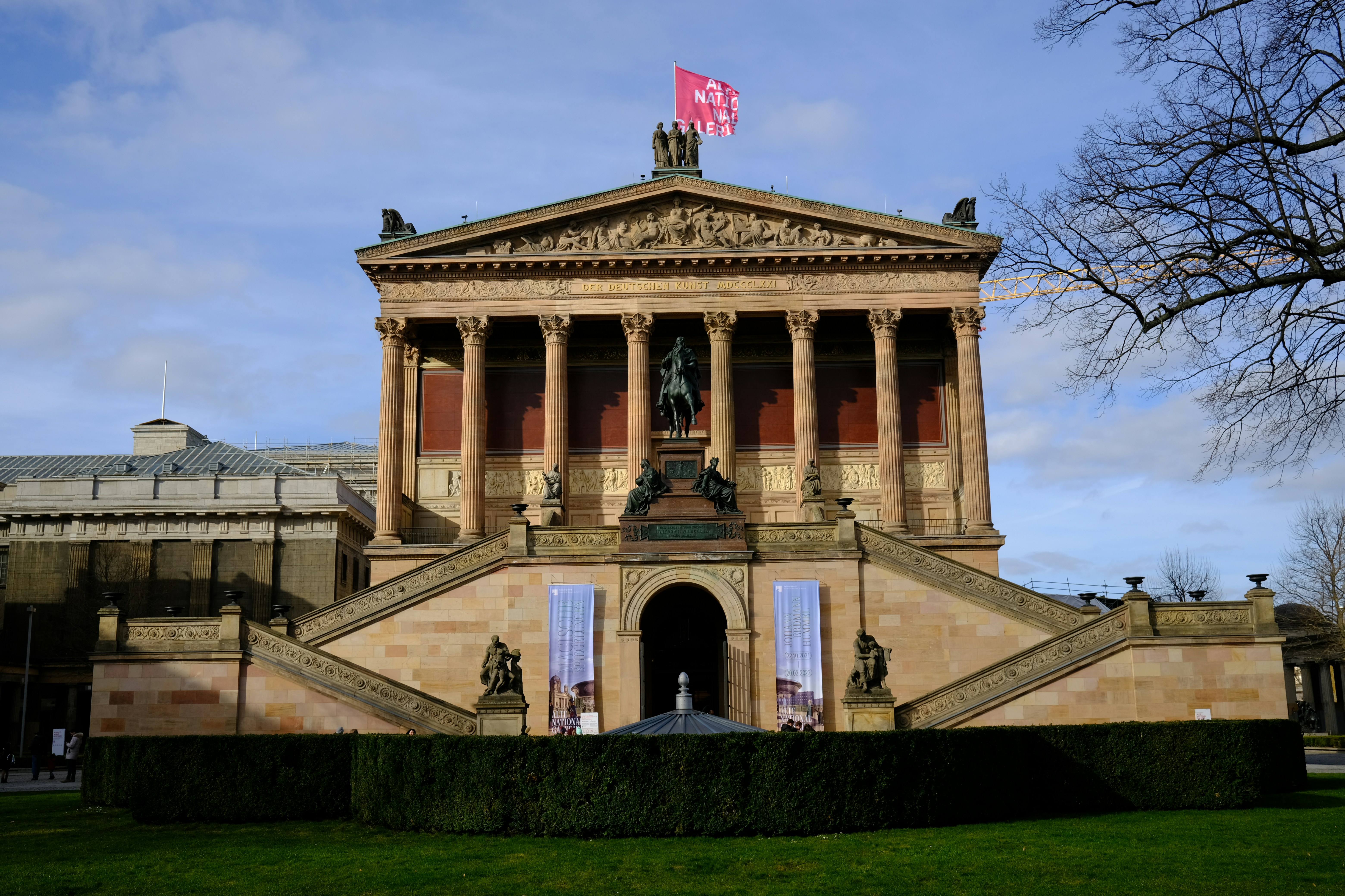 a large building with a flag on top of it