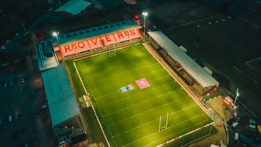 an aerial view of a soccer field at night