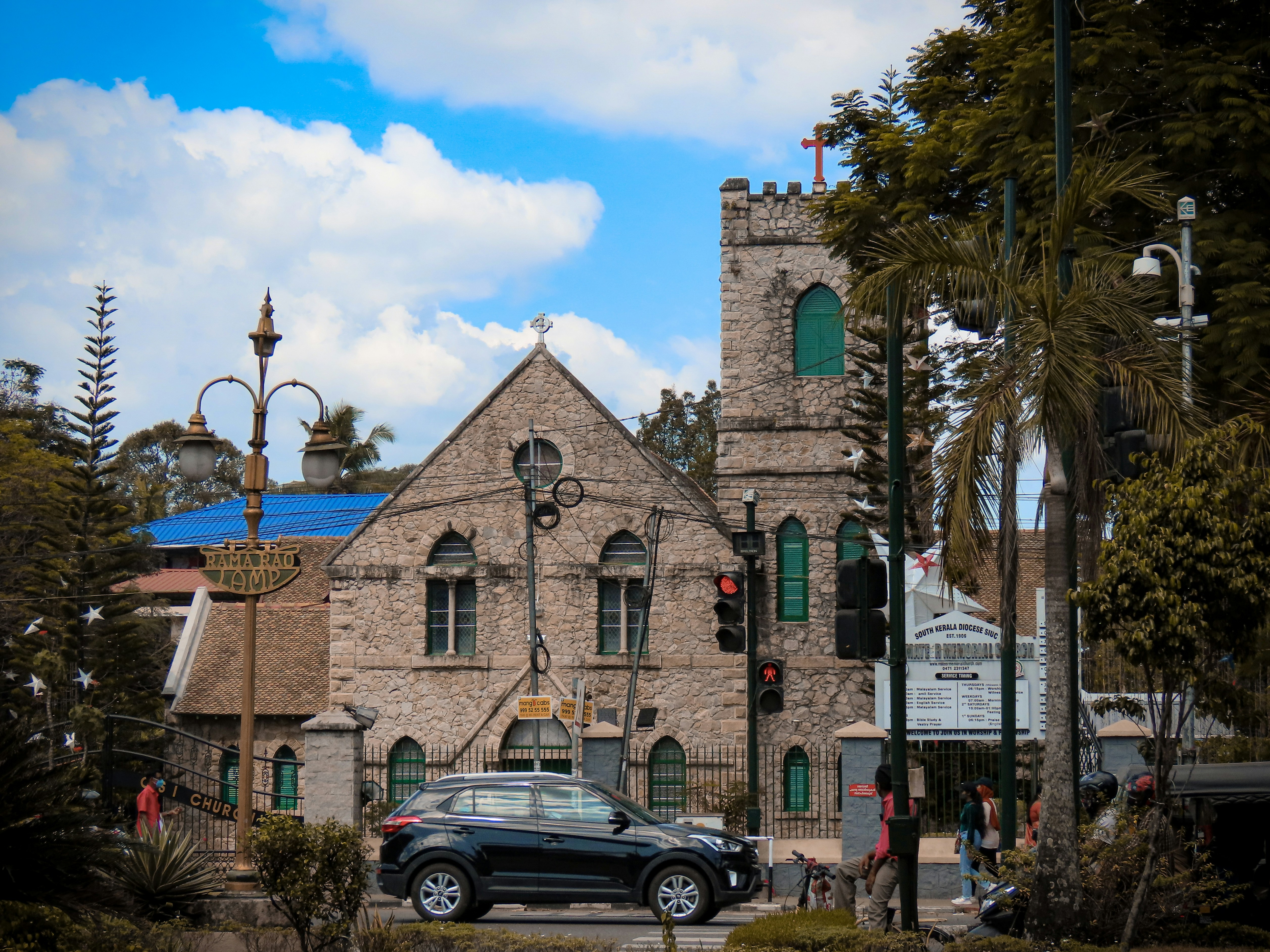 a car is parked in front of a church