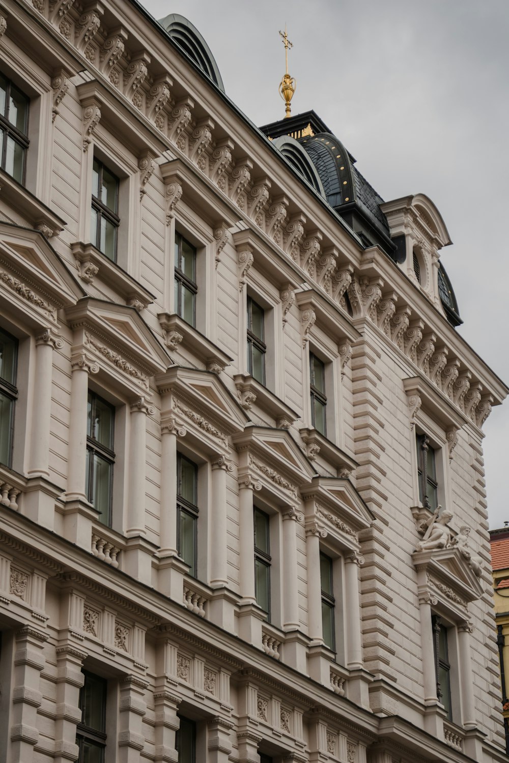 a large building with a clock on the top of it