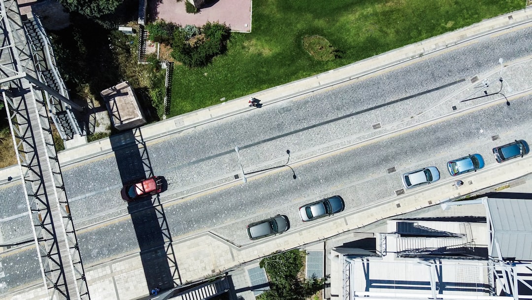 an aerial view of a street and a bridge, Heraklion Crete Streetphotography topdown