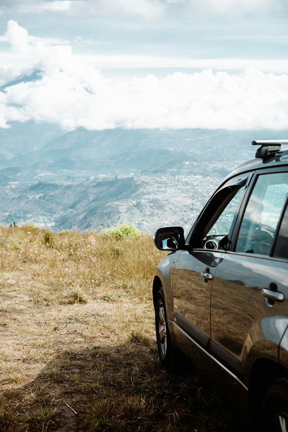 a car parked on the side of a hill