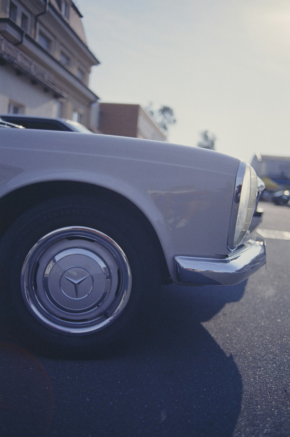 a white car parked on the side of the road