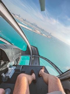 a man is sitting in the cockpit of a plane