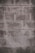 A concrete block wall with a rough texture, featuring rectangular blocks stacked in a staggered pattern. The surface appears weathered, with some areas showing darker stains or marks.