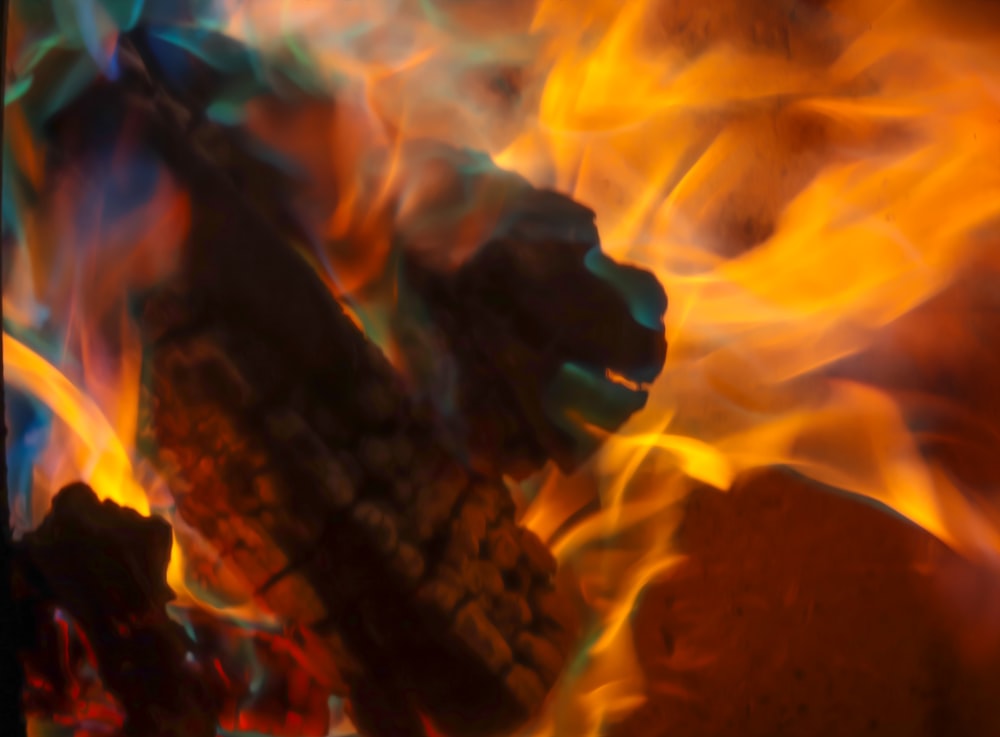 a close up of a fire with a blurry background