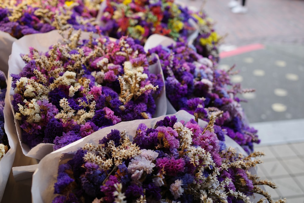 a bunch of flowers that are sitting on a table