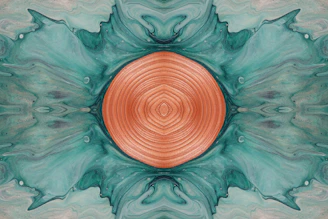 an abstract painting with a circular design in the center