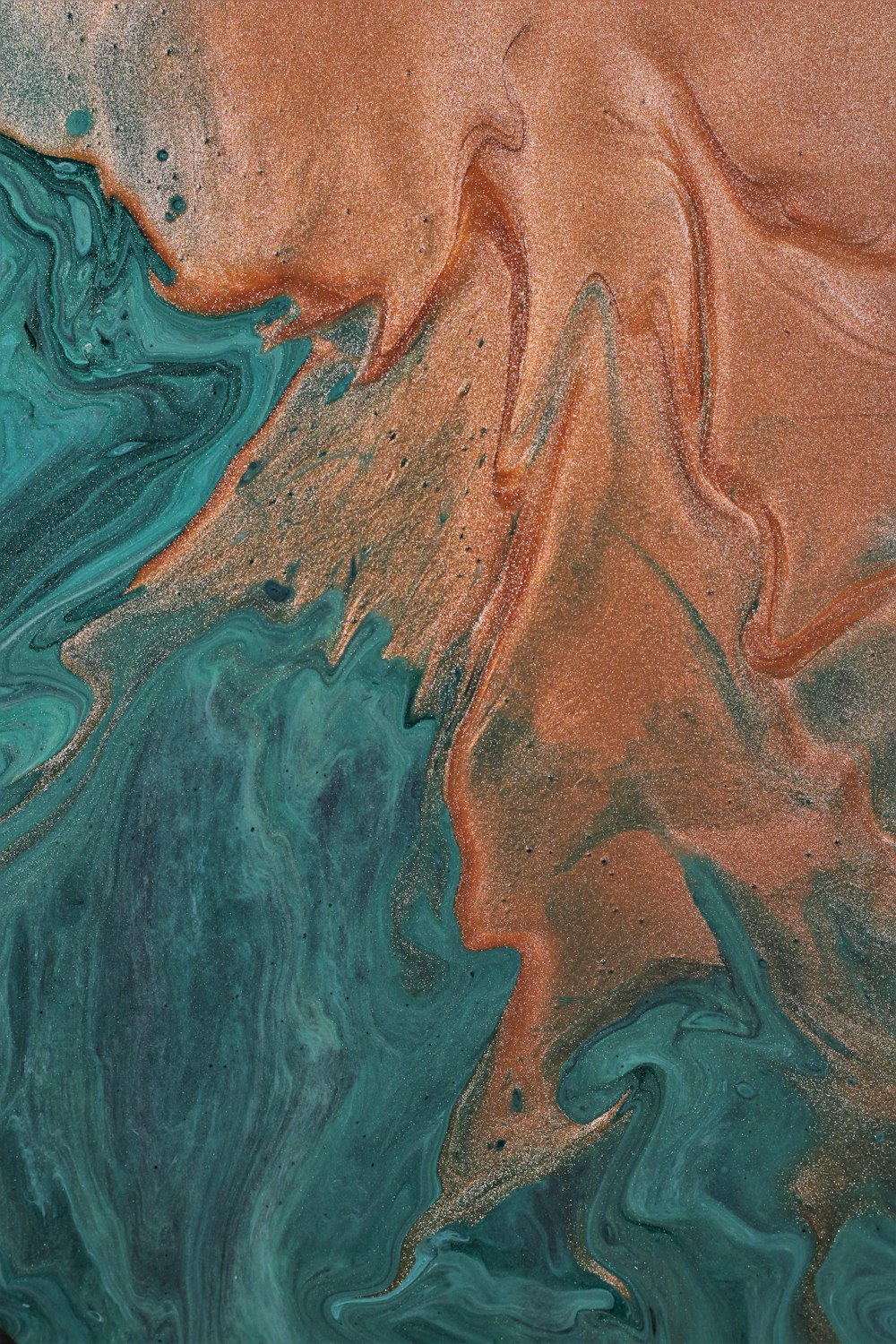 a close up of a blue and orange liquid