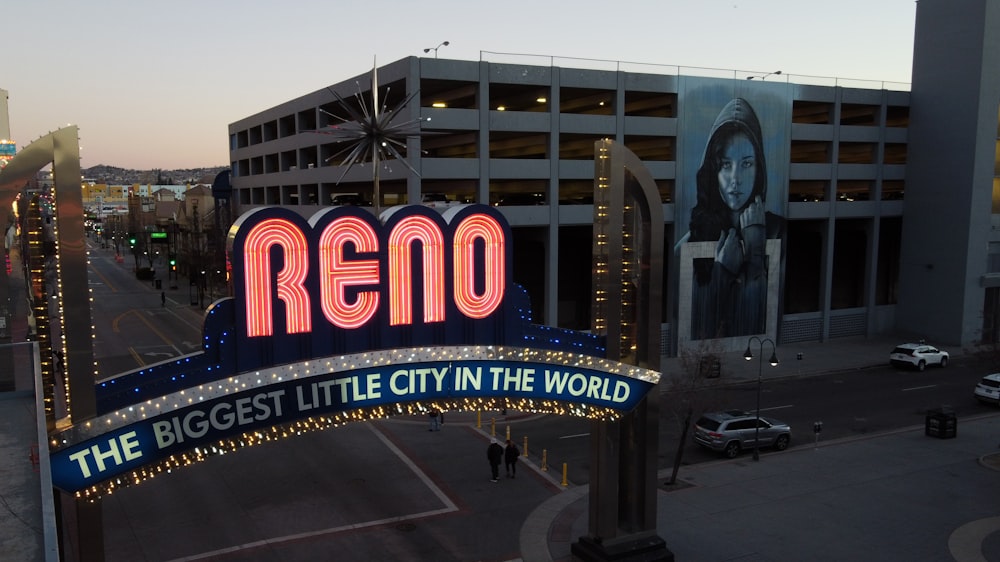 a neon sign that reads reno the biggest little city in the world