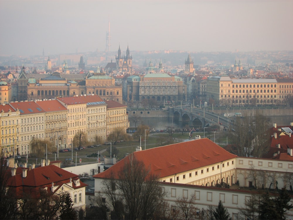 a view of a city with a bridge in the background