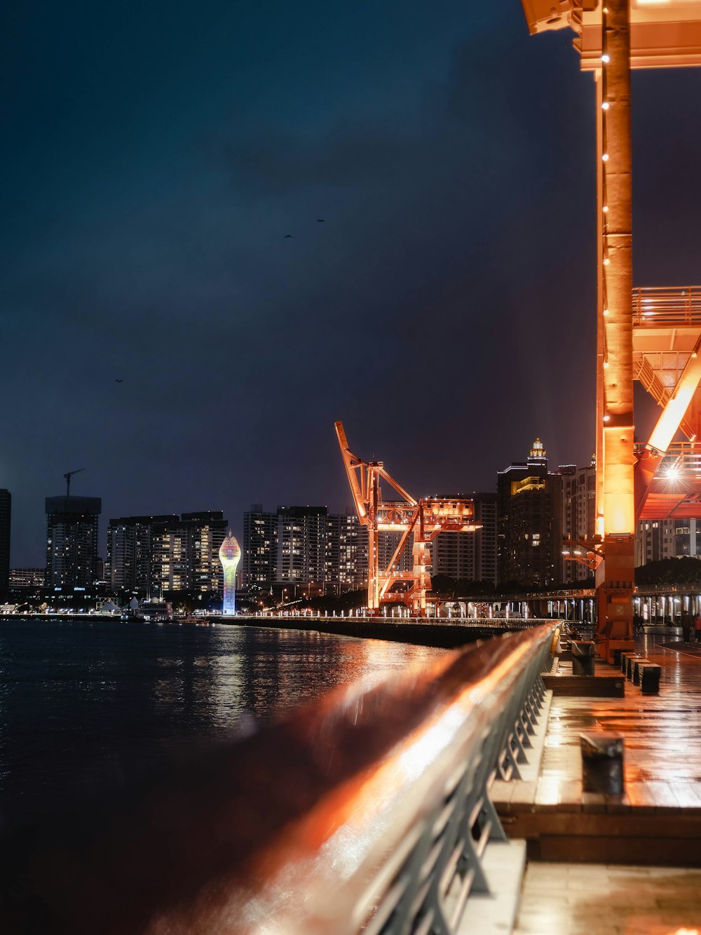 a view of a city at night from across the water