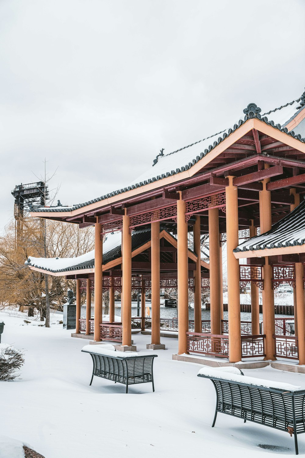 a couple of benches that are in the snow