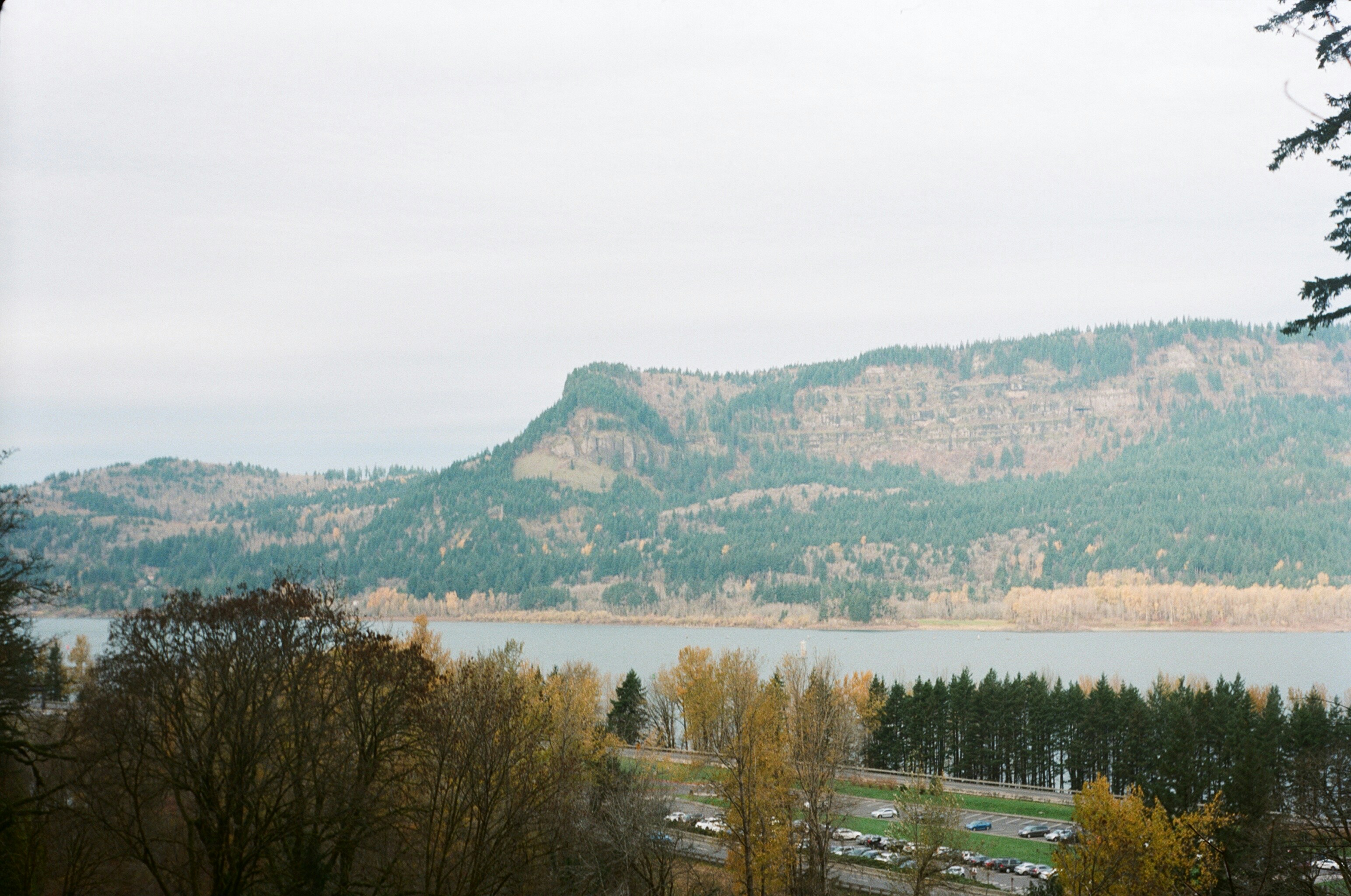 a scenic view of a lake and mountains