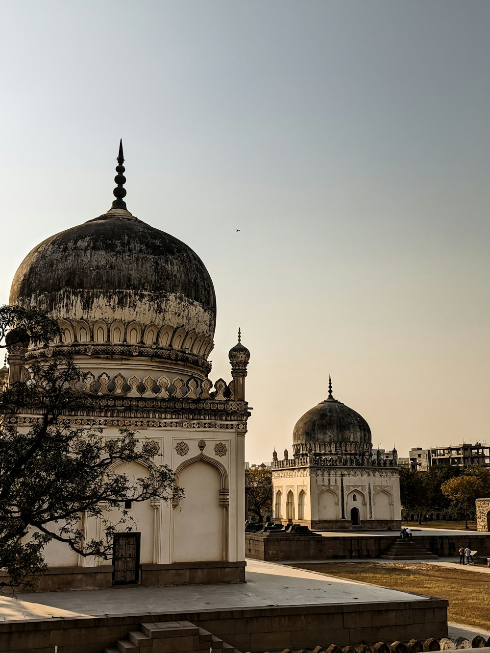 a large white building with a dome on top of it