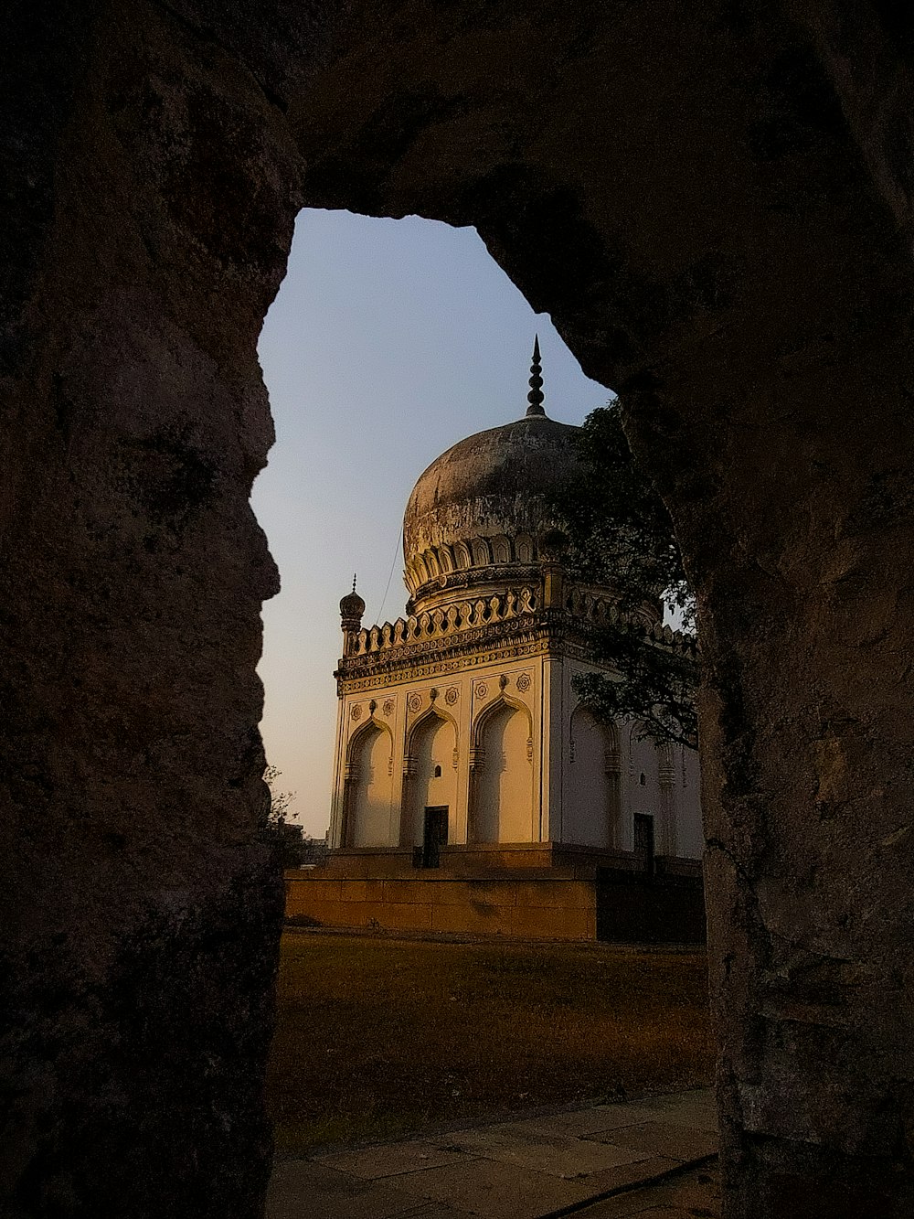 a large white building with a dome on top of it