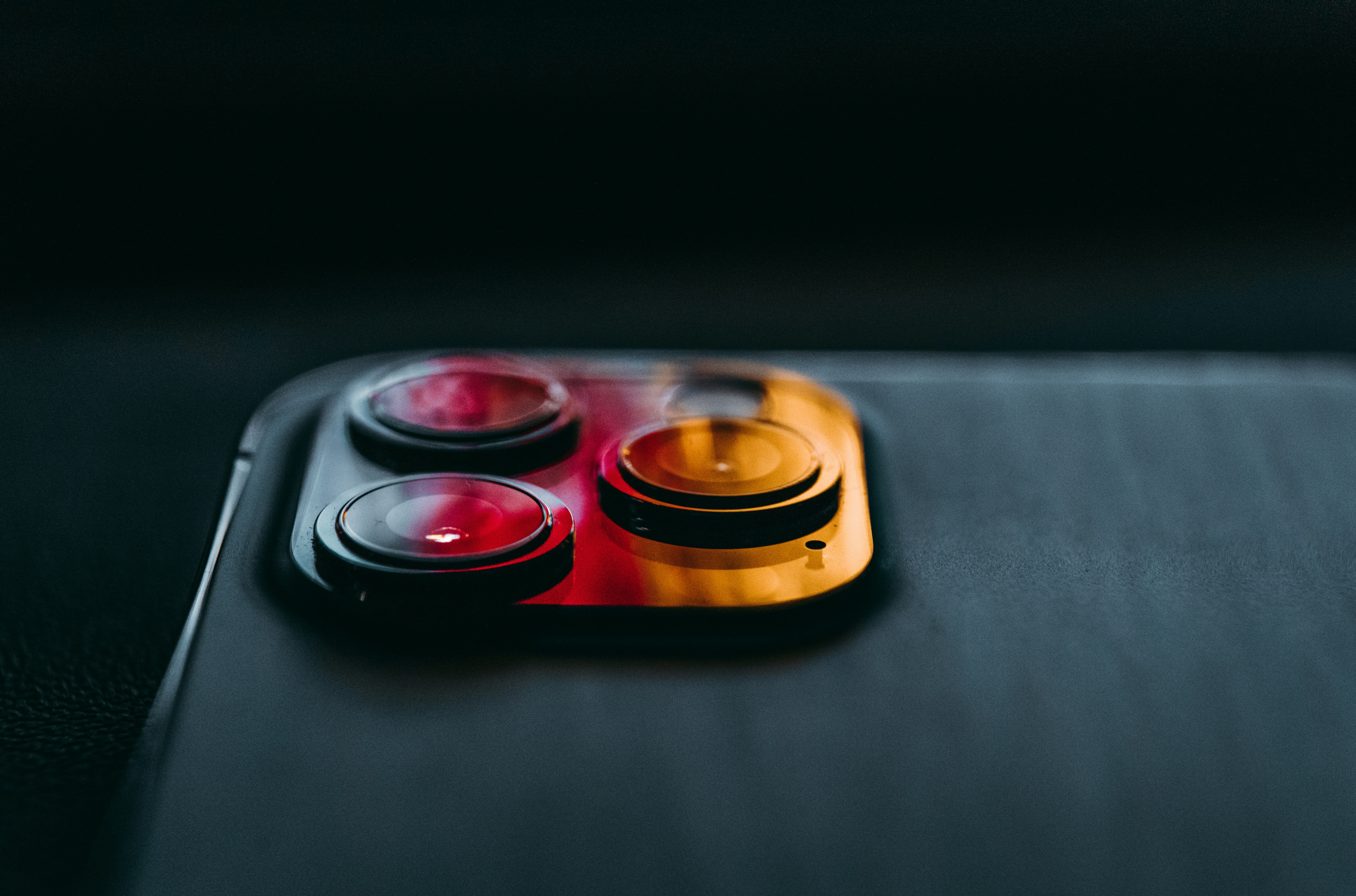 a close up of a cell phone with a controller