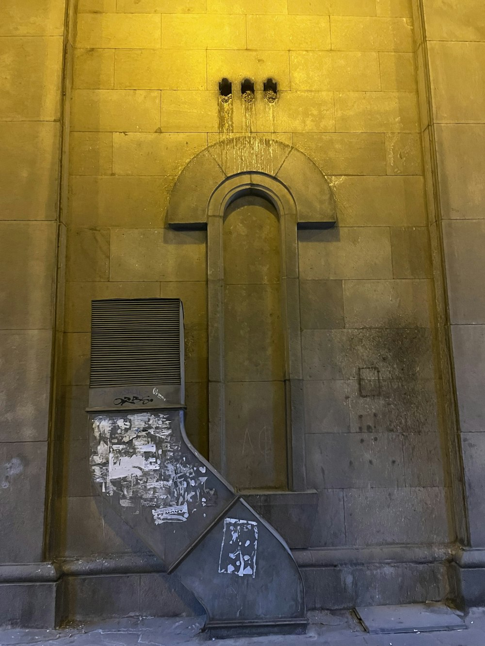 a tall building with a clock on the side of it