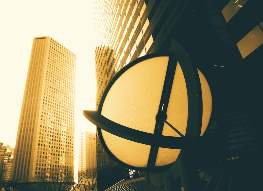 a street light in front of a tall building