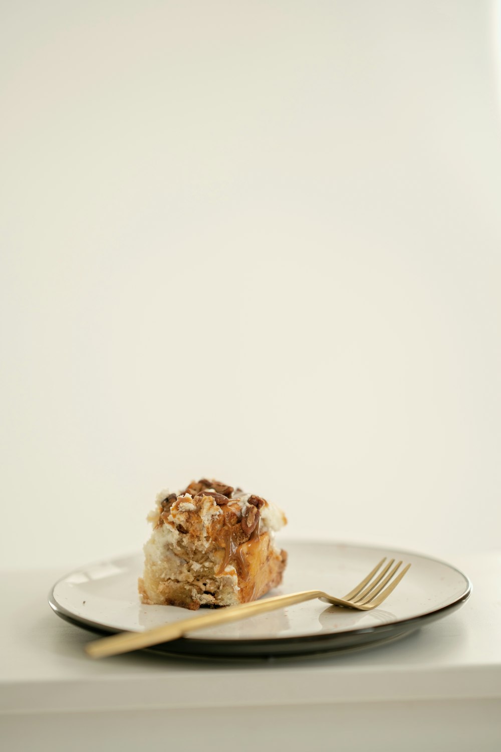 a piece of cake on a plate with a fork