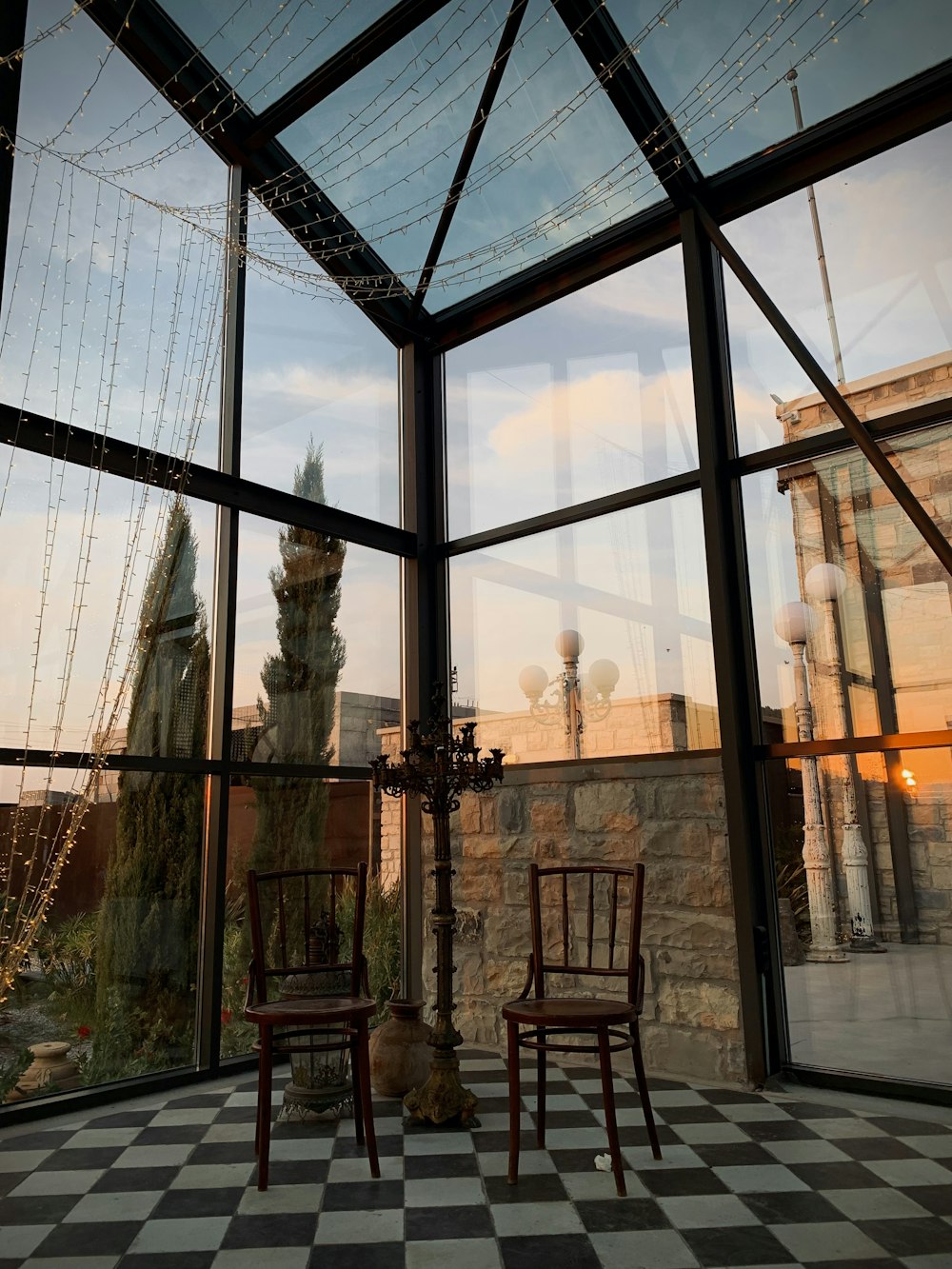 a couple of chairs sitting in front of a window