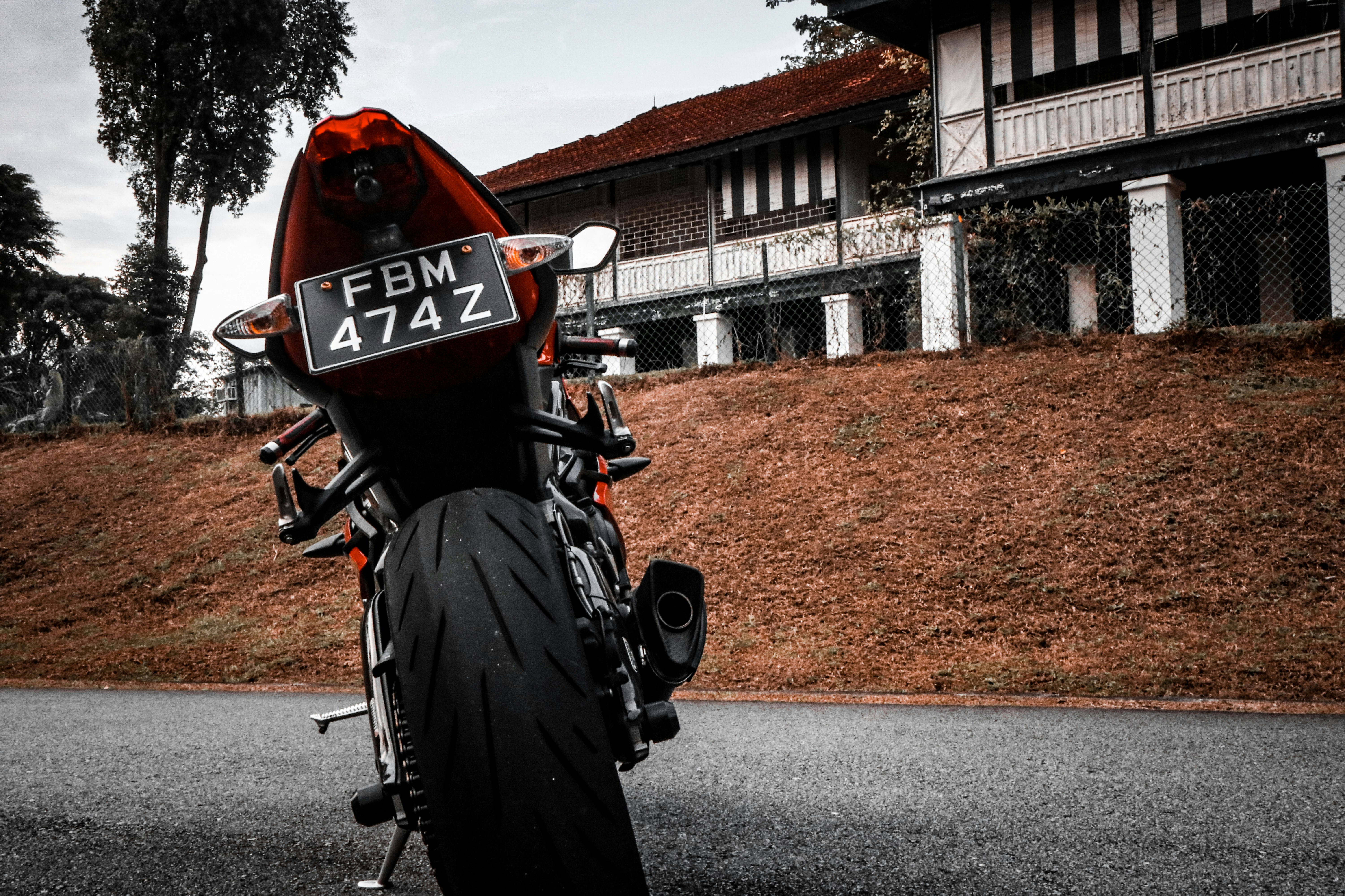 a motorcycle parked on the side of the road