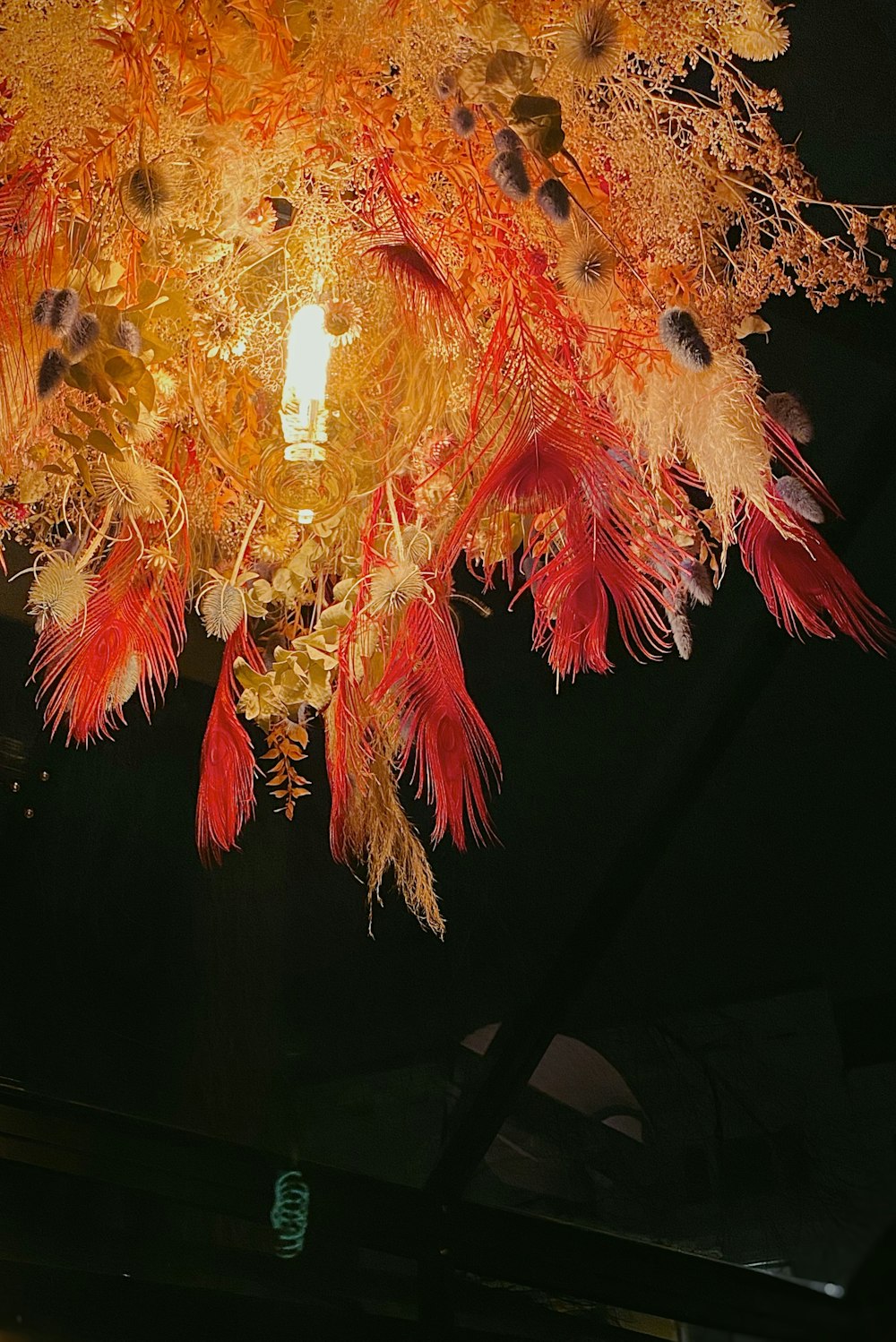 a chandelier hanging from a ceiling in a room