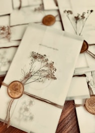 a table topped with lots of cards and envelopes