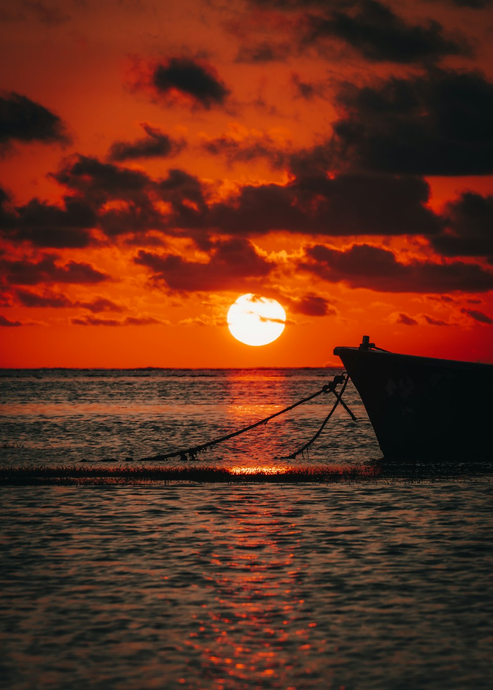 a sunset over a body of water